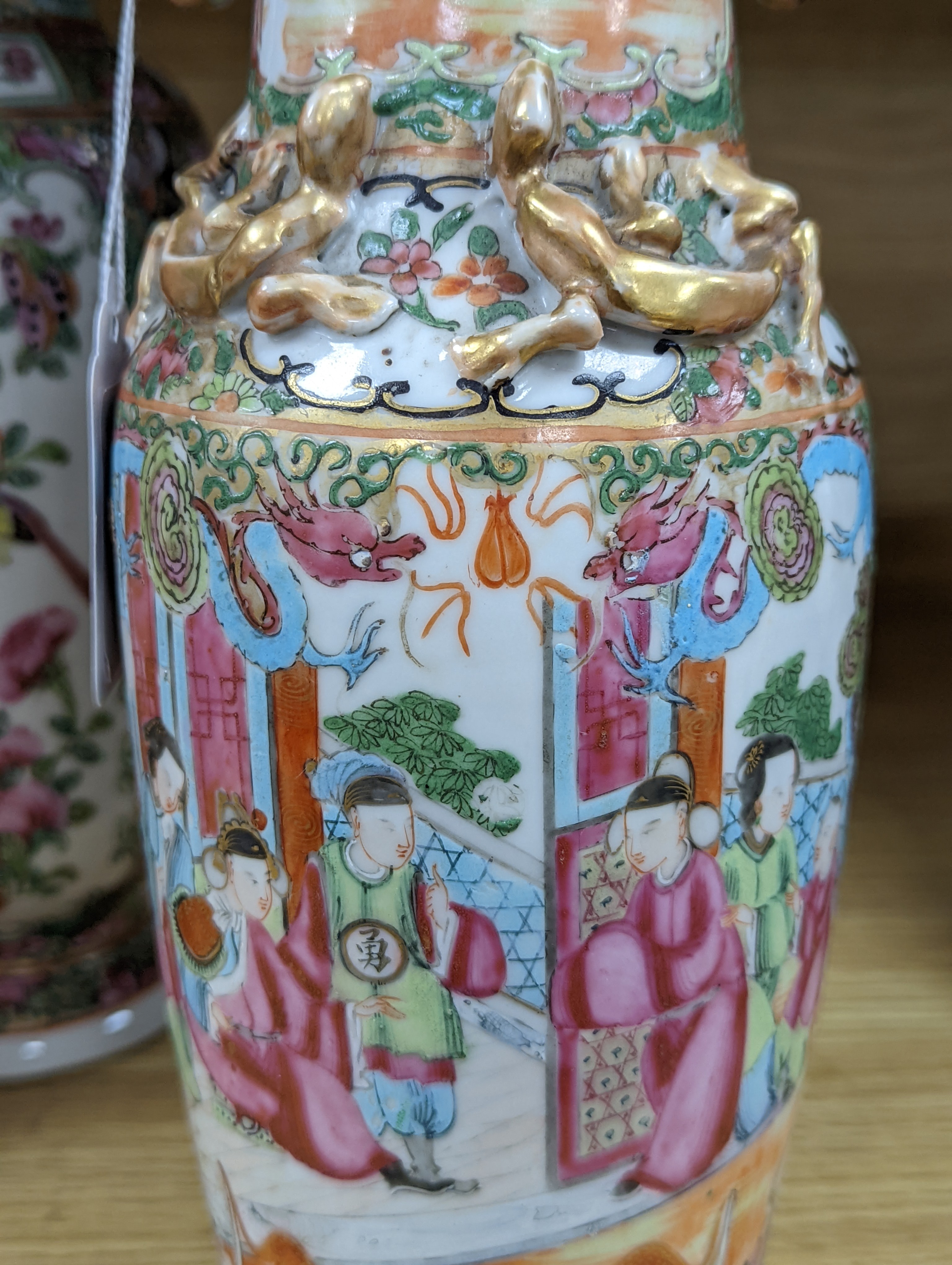 Two Chinese famille rose vases, late 19th century, tallest 26 cm, one wood stand, some restoration